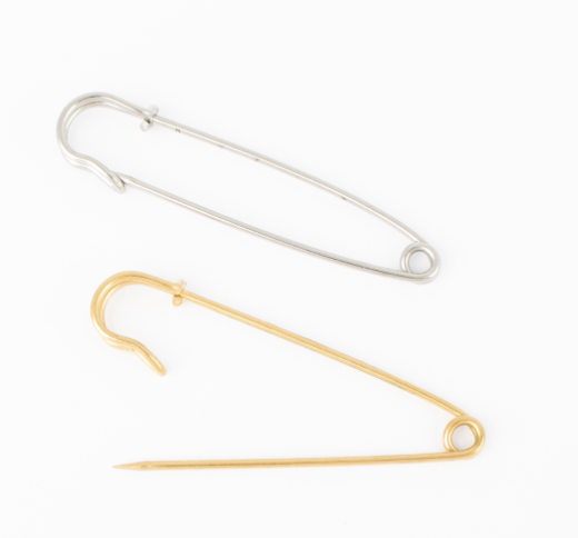 Classic Brooch Pin: Large safety-pin-style brooches in polished silver stainless and gold stainless on a white background.