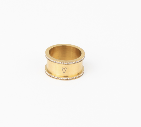 Personalized Marisol gold stainless wide-band ring with brushed center, crystal edges, and a small engraved heart.