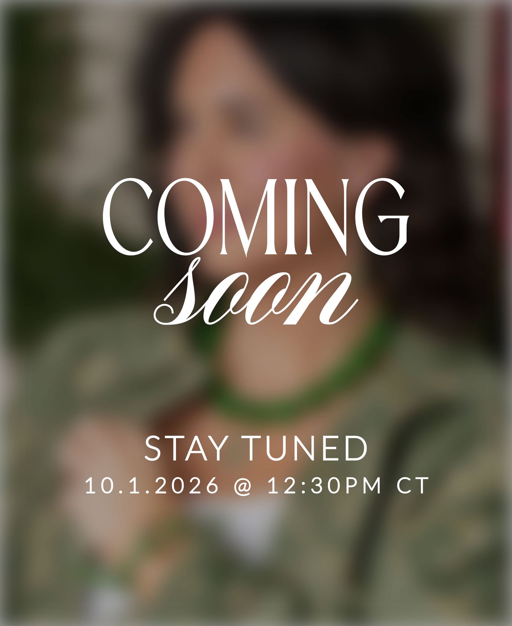 Coming soon” teaser over a blurred photo of a woman wearing a green necklace. Text reads, “Stay tuned—October 1, 2026, at 12:30 p.m. CT.”