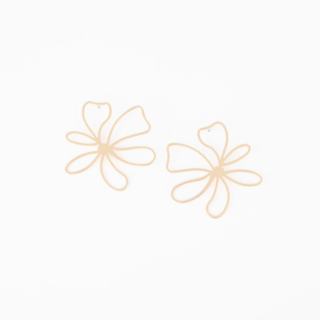 Pair of gold Talia earrings with large, open flower shapes on a white background.