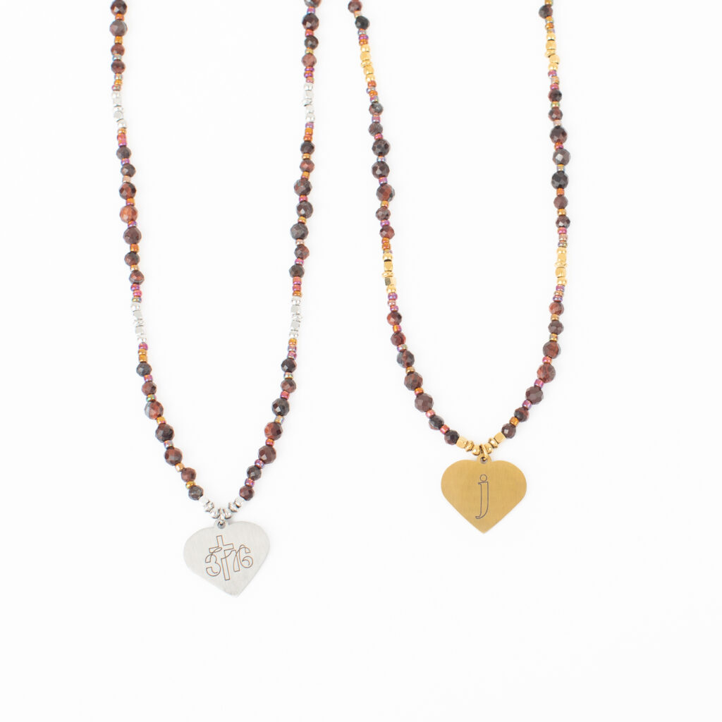 Angela beaded necklaces with stainless and gold stainless heart pendants showing example personalization