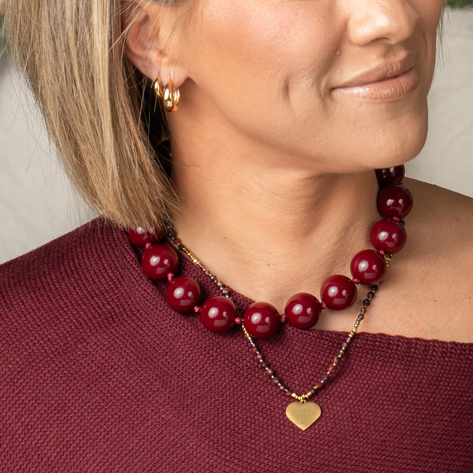How to Style a Burgundy Necklace with Clothes You Already Own