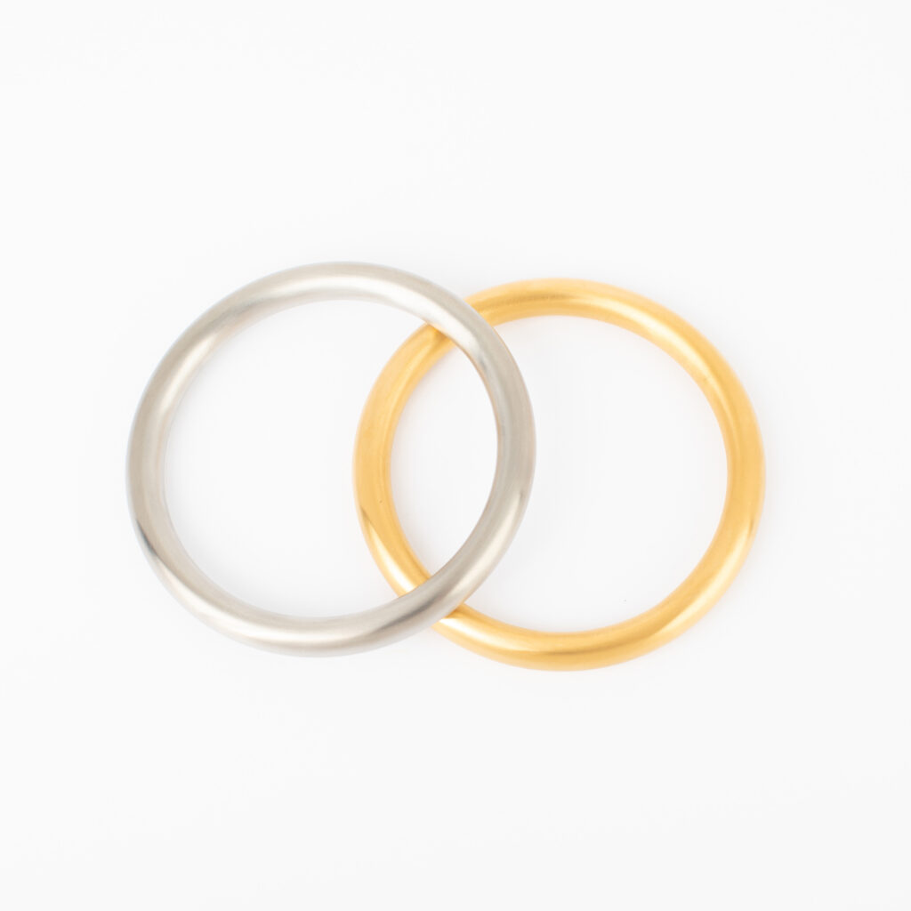 Caroline Bangle with its smooth rounded stainless steel design