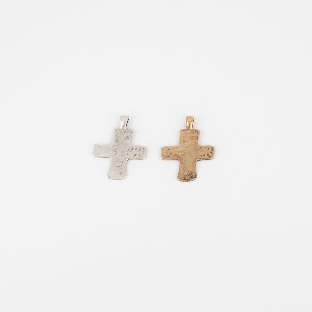 Hammered Cross Charm shown in silver and gold finishes