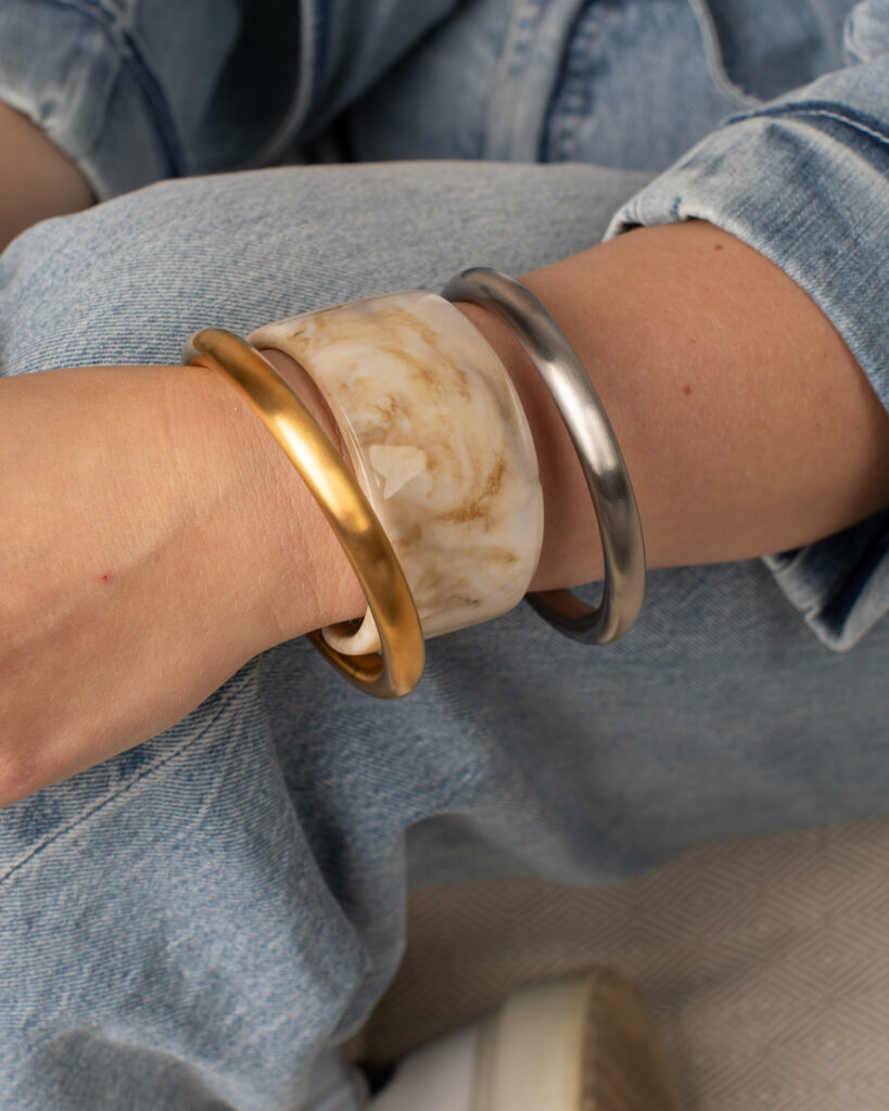 Caroline Bangle and Julep Bracelet styled together on a model