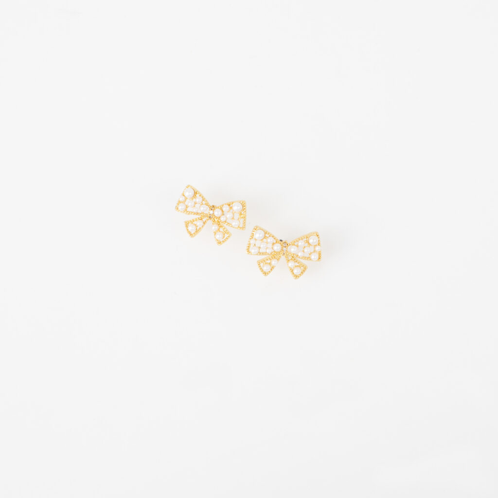 Londyn gold bow stud earrings with pearl accents