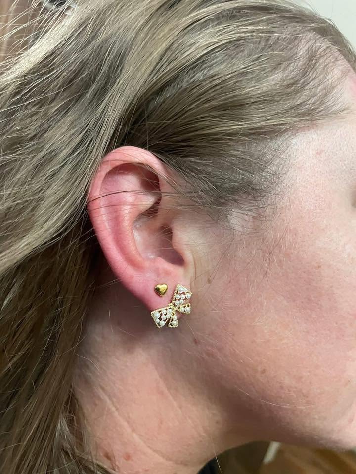 Londyn gold bow stud earrings with pearl accents