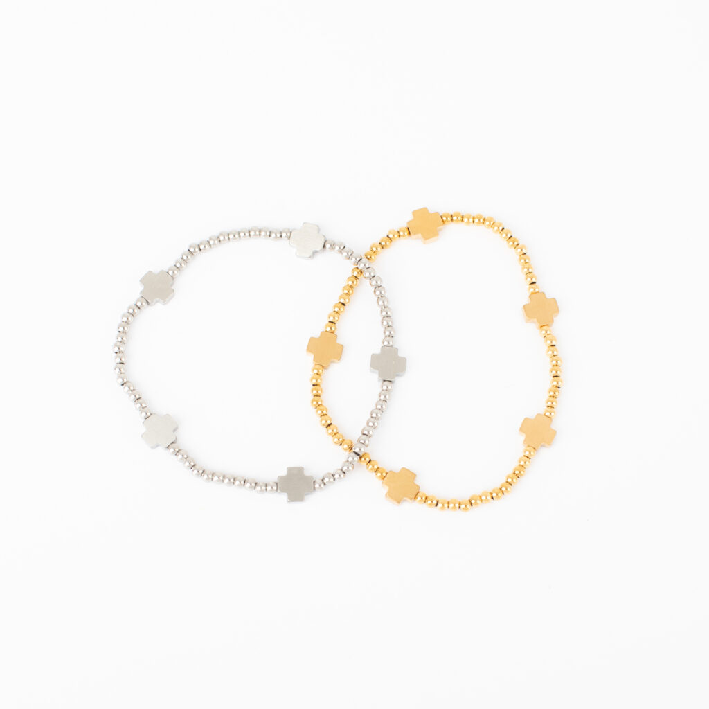 Ruth beaded stretch bracelets with quatrefoil details in stainless and gold stainless.